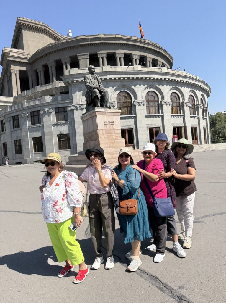 Luxury Women Travel Groups standing in front of building